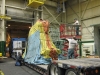 Workers are loading and tarping the shipment